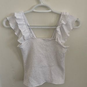 White frilly tank